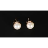 PAIR OF CULTURED PEARL STUD EARRINGS, each half pearl set it 9ct gold, 8mm diameter, London 1989,