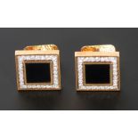 PAIR OF DIAMOND AND ONYX CUFFLINKS, bezel set with square onyx with a pave set surround of twenty