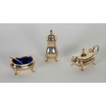 SILVER CONDIMENT SET OF THREE PIECES of bulbous rounded oblong form with cyma borders and raised
