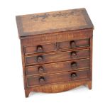 NINETEENTH CENTURY CROSSBANDED MAHOGANY APPRENTICE PIECE IN THE FORM OF MINIATURE CHEST, of two