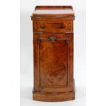 LATE 19TH CENTURY CARVED AND BURR WALNUT WOOD BOW FRONTED BEDSIDE CABINET with loose pink marble
