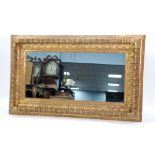 LARGE OBLONG WALL MIRROR in heavy moulded gilt frame, approx. 60" wide