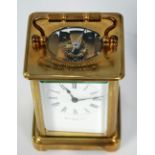 LATE 19th CENTURY BRASS TIMEPIECE CARRIAGE CLOCK, the dial inscribed Rus Ells Ltd, Paris, engraved