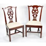 PAIR OF GEORGE III CARVED MAHOGANY SINGLE DINING CHAIRS, in the Chippendale style, each with shaped