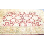 INDIAN HAND MADE SMALL CARPET, with large Heratic formal pattern on a cream field, the principal