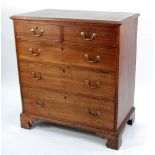 GEORGE III MAHOGANY CHEST OF DRAWERS, the moulded oblong top above two short and three long