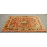 KIRMAN PERSIAN RUG, with midnight blue, white and pale blue spandrels and centre medallion with
