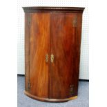 GEORGE III MAHOGANY BOW FRONTED HANGING CORNER CUPBOARD