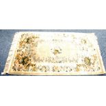 'KAYAM' CHINA HAND KNOTTED SILK PILE RUG, with centre small embossed floral medallion and surround