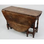 EIGHTEENTH CENTURY OAK GATELEG TABLE, the D shaped end and turned legs, tied by flat stretchers,