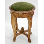 LATE NINETEENTH CENTURY CONTINENTAL CARVED GILTWOOD STOOL, the circular padded drop in seat