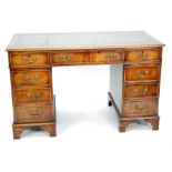 MODERN GEORGIAN STYLE TWIN PEDESTAL MAHOGANY DESK, the moulded oblong top with antique green leather