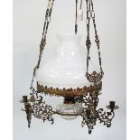 LATE 19TH CENTURY PENDANT OIL LAMP with gilt metal frame holding the reservoir, the three twin