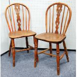 A SET OF FOUR ANTIQUE YEW AND ELM WINDSOR SINGLE CHAIRS, WITH PIERCED SPLAT AND RAIL HOOP BACK,