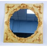 CIRCULAR WALL MIRROR with gilt gesso Rococo pattern border on gilt square panel with scroll corner