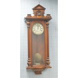 LATE NINETEENTH/EARLY TWENTIETH CENTURY WALNUTWOOD AND STAINED BEECH VIENNA WALL CLOCK by Gustave