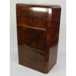 POSSIBLY EPSTEIN ART DECO BURR WALNUT UPRIGHT COCKTAIL CABINET, the part hinged top enclosing a