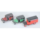 TWO DINKY TOYS DIE CAST TAXIS No 36g with driver and open rear window, maroon and black and green