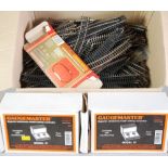 Selection of 'OO' model rail accessories includes plastic and kit made paper buildings, track and