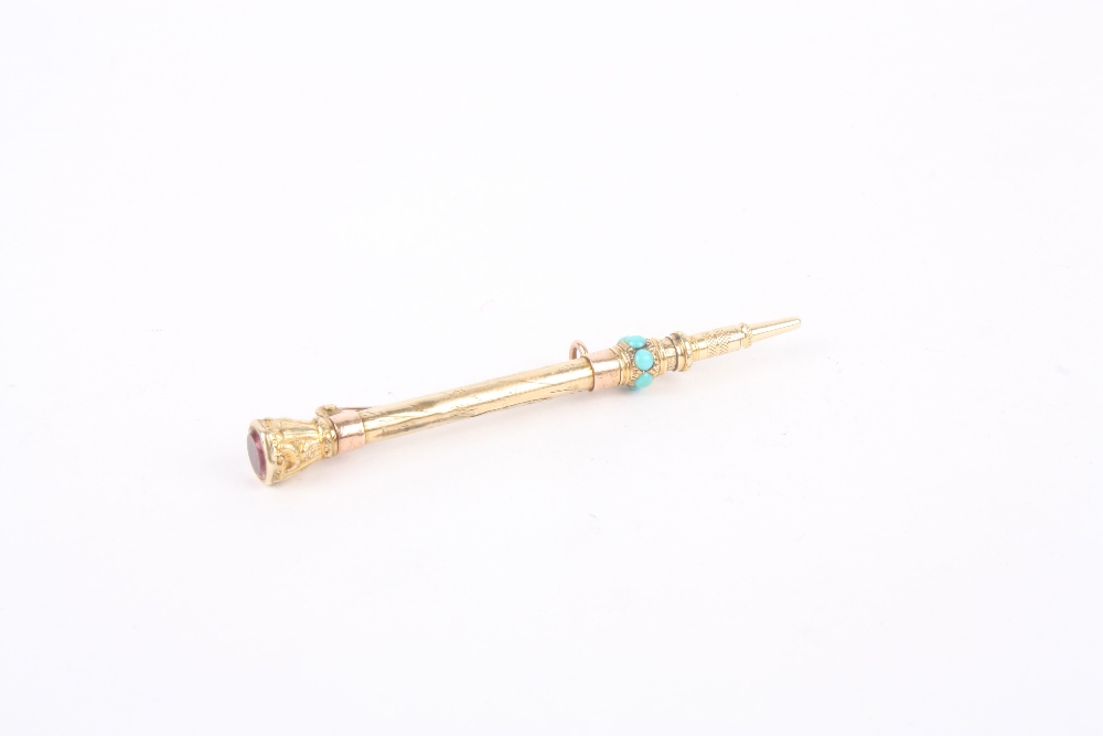 A Victorian yellow metal propelling pencil converted to a brooch, with turquoise studded fixed