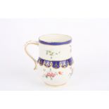 An 18th century Chelsea Derby porcelain cider mug, circa 1775, of bulbous form with cylindrical