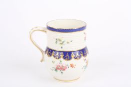 An 18th century Chelsea Derby porcelain cider mug, circa 1775, of bulbous form with cylindrical