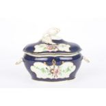 An 18th century Worcester tureen and cover with moulded finial handle, and shell shaped handles,