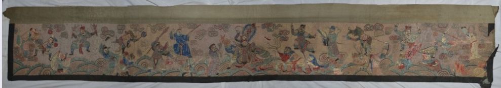 A 19th/20th century Chinese embroidered and appliquéd altar table cloth/panel, worked with gods