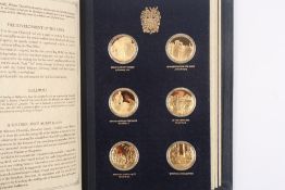 The Churchill Centenary Medals, A Limited edition bound set of 24 silver gilt medals, minted by John