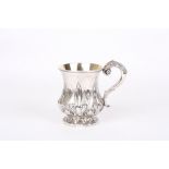 A George III silver gilt tankard, with repoussé decoration of acanthus leaves and geometric,