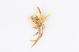 A gold and diamond bird brooch, formed as a bird of paradise studded with diamonds, with a