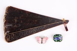 An enamel and metal butterfly brooch, together with a metal and enamel rectangular brooch with