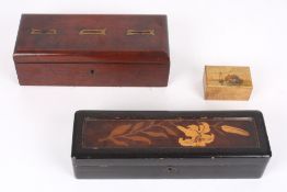 A Victorian mahogany money box, together with a Japanese lacquer glove box and a small painted