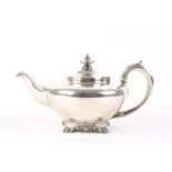 A George IV silver teapot, hallmarked London 1829, with scrolled handle and ivory spacers, supported