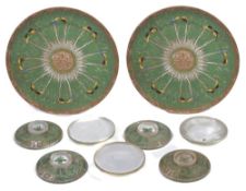 A pair of 20th century Canton ‘famille-rose’ plates, each decorated with butterflies amongst
