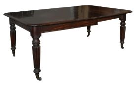 A Victorian mahogany dining table, with centre leaf, tapered moulded legs and castors, 228cm long,