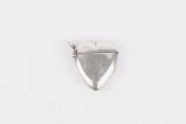 A novelty silver vesta case in the form of a heart, hallmarked Birmingham 1900, with makers initials