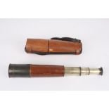 A 19th century day or night brass and leather four draw telescope, signed on the first draw Ross,