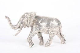 A Modern silver elephant, hallmarked Sheffield 1997, with makers initials for Camelot silverwear,