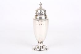 A silver shaker, hallmarked Birmingham, 1929 and mark for Selfridges & Co, height 16cm . With