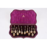 A set of twelve Victorian silver gilt apostle spoons, hallmarked London 1878, each terminal with