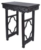 A Chinese hardwood altar table, late 19th century the front and sides with carved decoration, 99cm