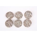 A set of six Edwardian silver buttons decorated with the four flowers of the United Kingdom,