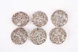 A set of six Edwardian silver buttons decorated with the four flowers of the United Kingdom,