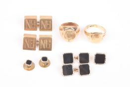 Two sets of gold cufflinks and two gold rings, comprising: a set of 9ct gold cufflinks with initials