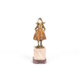 An early 20th century cold painted bronze figure of Dutch girl by Hanns Keck, signed on the side and