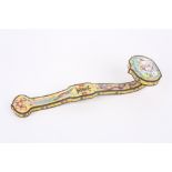 A 20th century Chinese Canton enamel ruyi sceptre, the head painted with a scene of a figure in a
