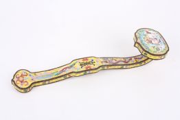 A 20th century Chinese Canton enamel ruyi sceptre, the head painted with a scene of a figure in a