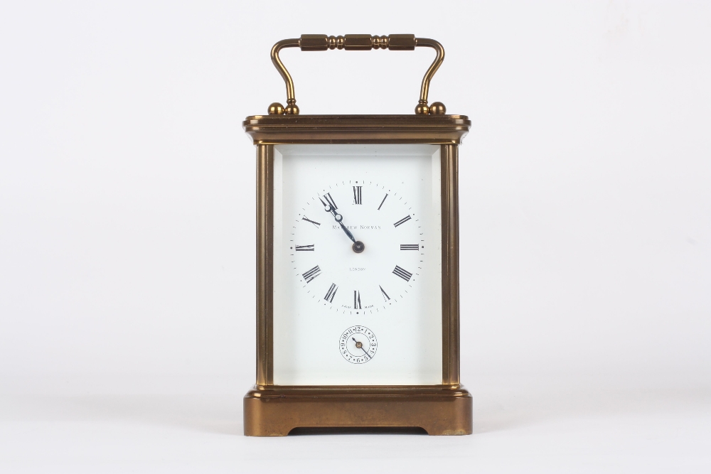 A Modern lacquered brass carriage clock, Swiss with movement signed Matthew Norman No 1750, striking