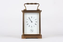 A Modern lacquered brass carriage clock, Swiss with movement signed Matthew Norman No 1750, striking